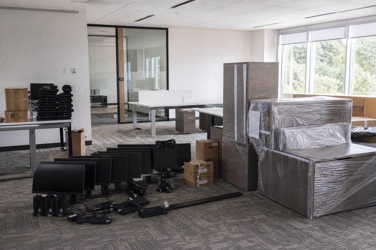 New workplace equipment staged for deployment on an office floor